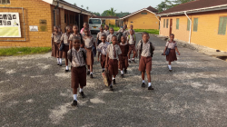 Some of the children on their way to school. The children go to the public school in Mkuranga so tha